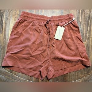 Universal Threads women’s drawstring short. Orange. New with tags. Size M.